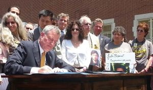 Mayor DeBlasio signing Vision Zero traffic bills.