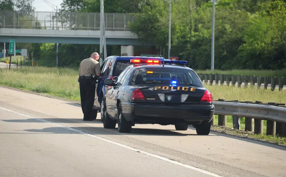 police pulling over driver for speeding ticket