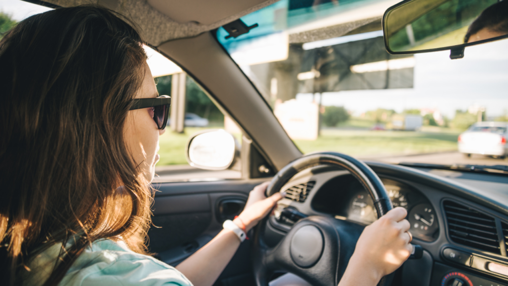 A woman driving in the city